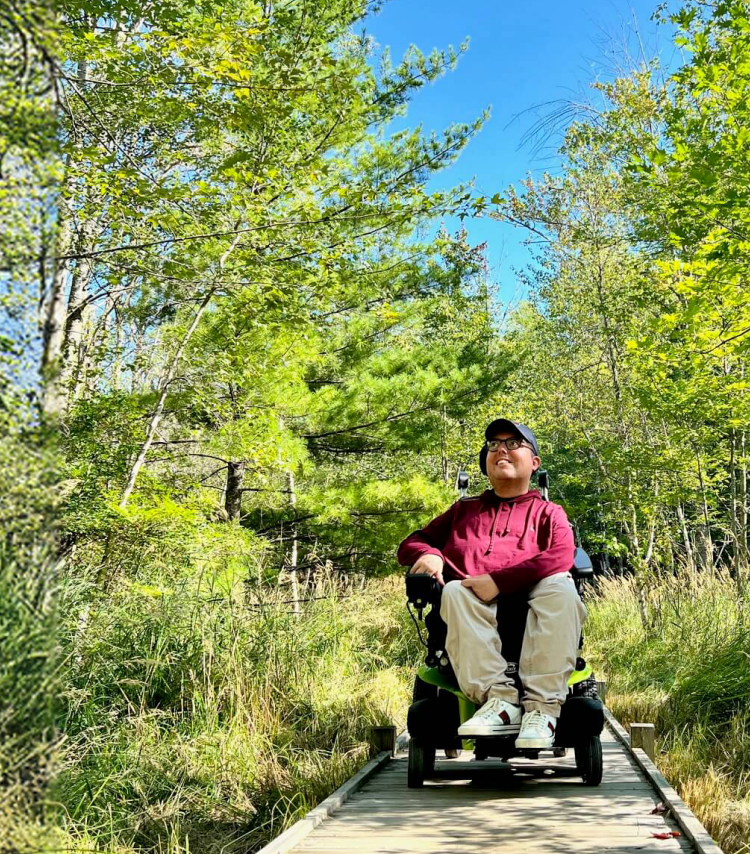 Explore Accessible Travel Tips featuring advocate Cory Lee on a wooded trail