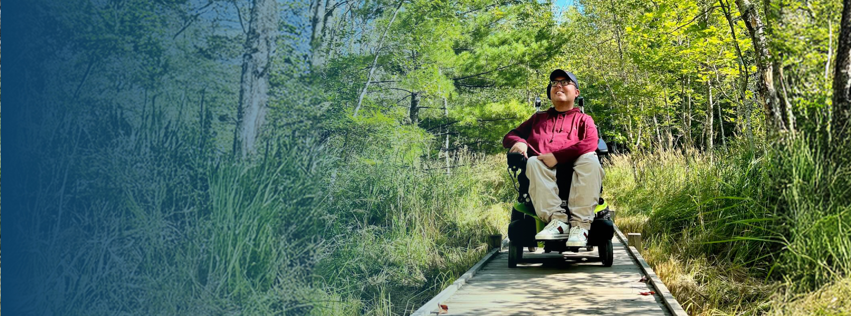 Accessible travel advocate Cory Lee uses a power wheelchair on a wooded trail